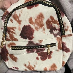 Small cow print backpack purse. Brand new never been carried